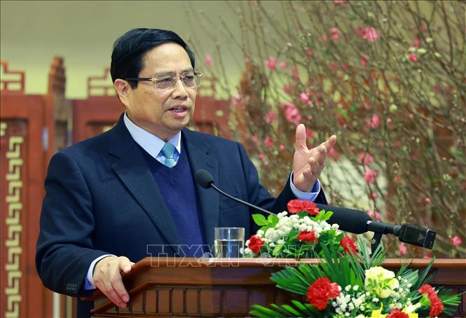 Prime Minister Pham Minh Chinh extends New Year greetings and assigns tasks to the banking sector